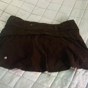 Lululemon Play Off the Pleats black skirt women’s size 8